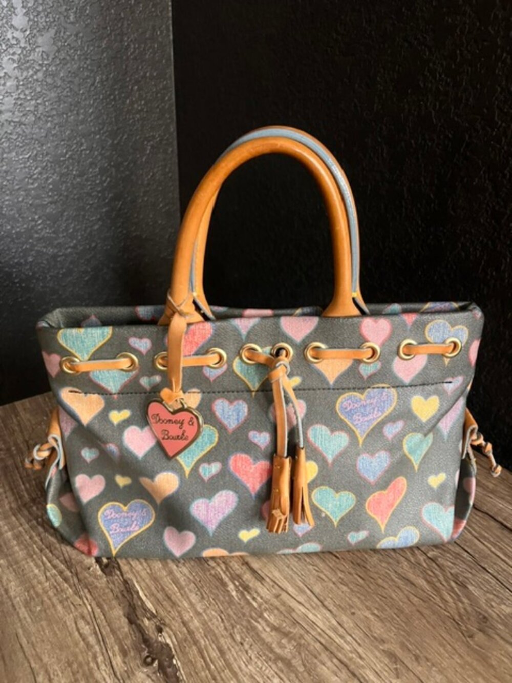 Dooney & Bourke Lindsay Lohan “Hearts and Charms” Tassel Tote Bag